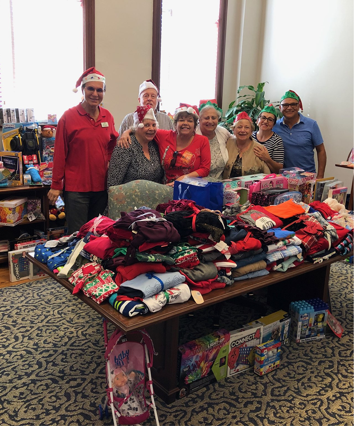 Bella Verde Realty team supporting a community holiday donation drive